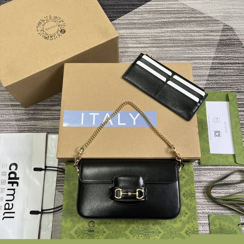 G*u*i top handle bags